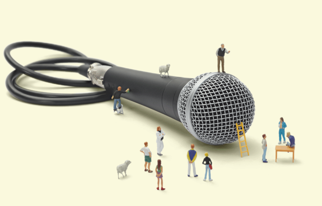 amasol miniature world with a microphone and miniature people all around