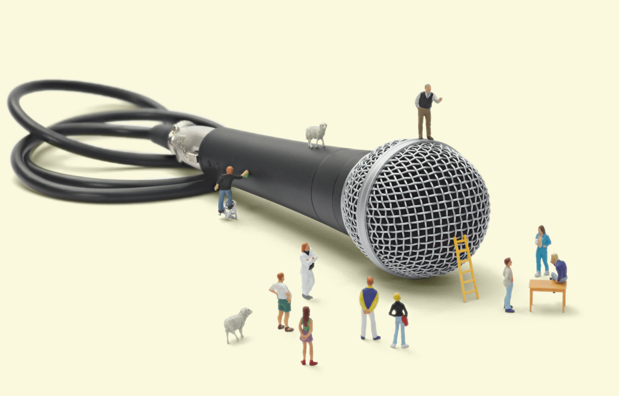 amasol miniature world with a microphone and miniature people all around